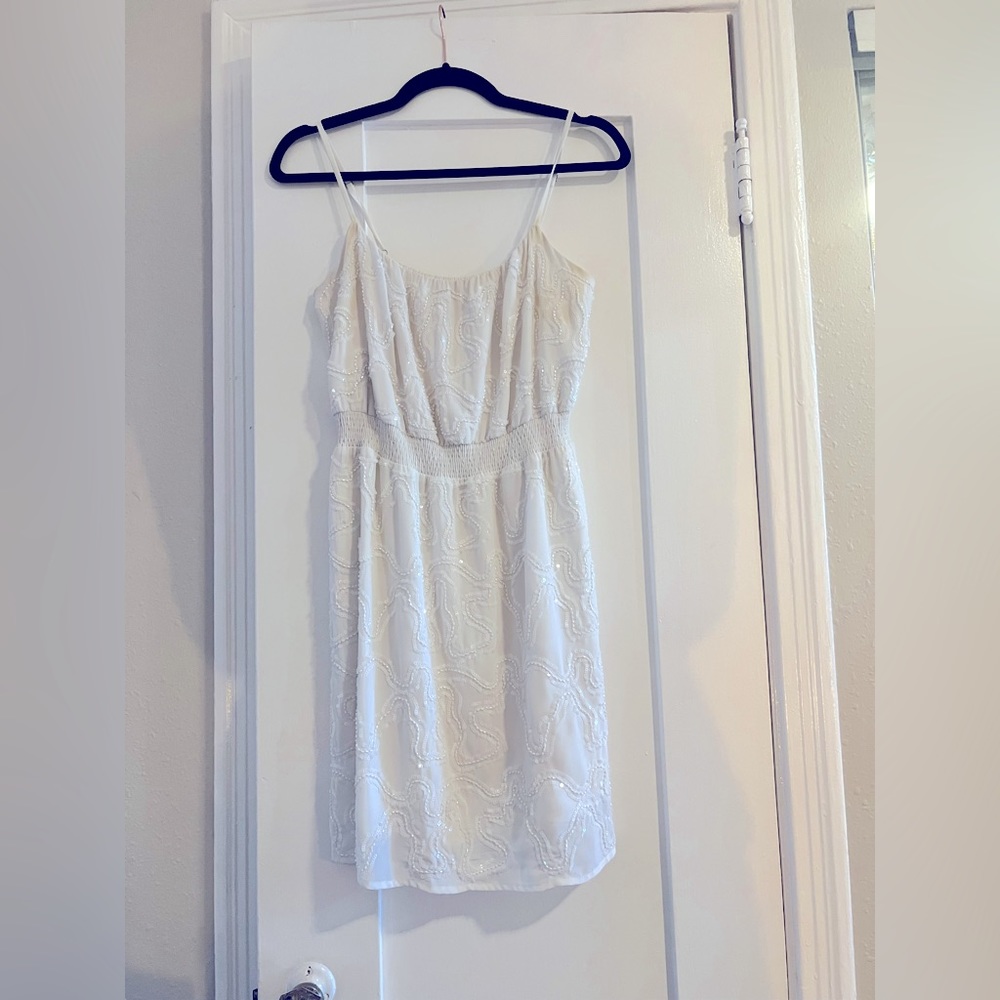 Couture White Dress. Perfect for brides or wedding related fun. Size Small.
